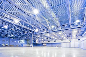 Image of Empty Clean High Ceiling Warehouse with Blue Tint