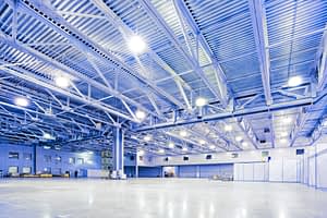 Image of Empty Clean High Ceiling Warehouse with Blue Tint